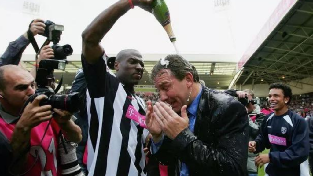 Kevin Campbell and Bryan Robson celebrate the Great Escape at West Brom