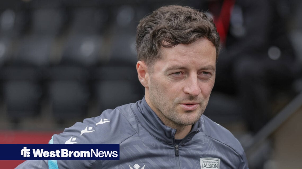 West Brom boss Ryan Mason watches on