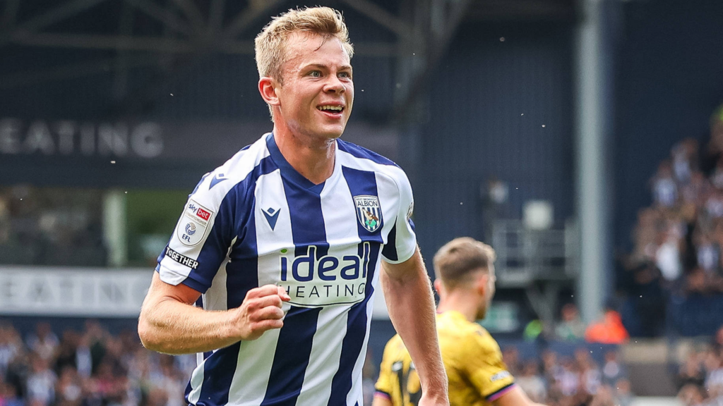 West Brom striker Aune Heggebo celebrates a goal.