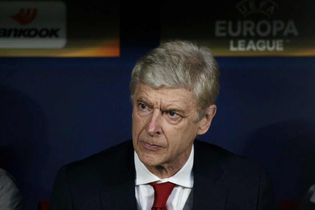 Arsene Wenger looks on