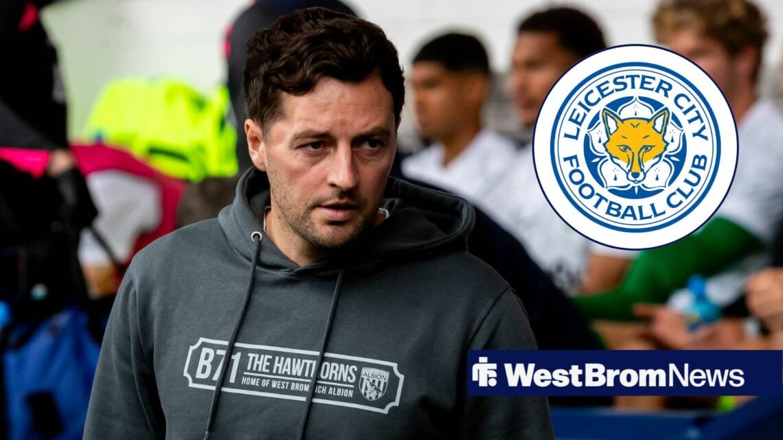 West Brom manager Ryan Mason stares frustratedly towards the Leicester City badge, which features in a circular inset.