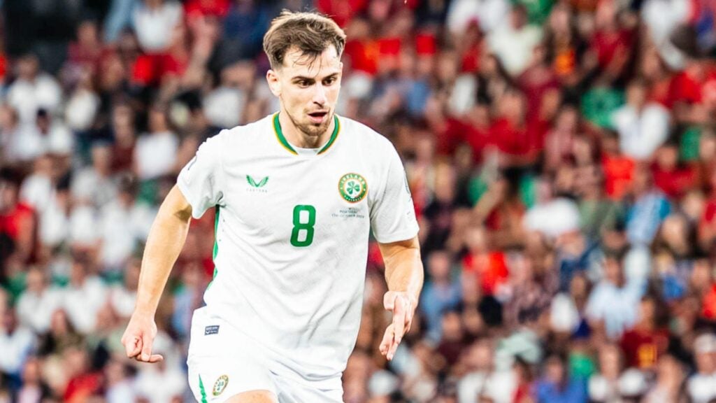 West Brom star Jayson Molumby stares at the floor while in action during a game for Ireland.