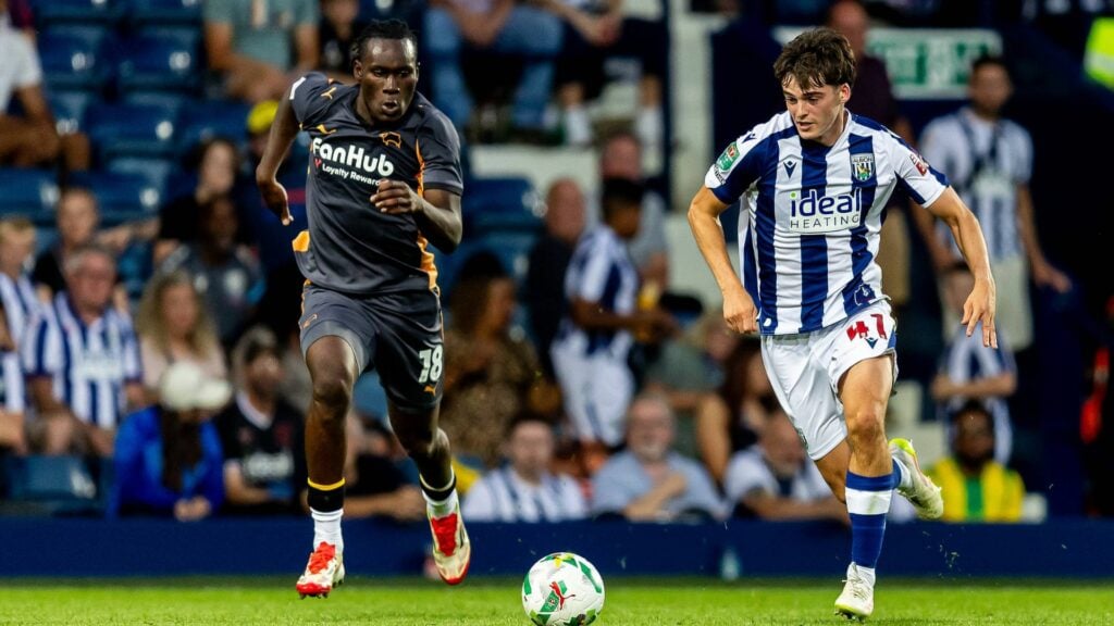 West Brom prospect Alex Williams in action as he carries the ball in a game against Derby County.