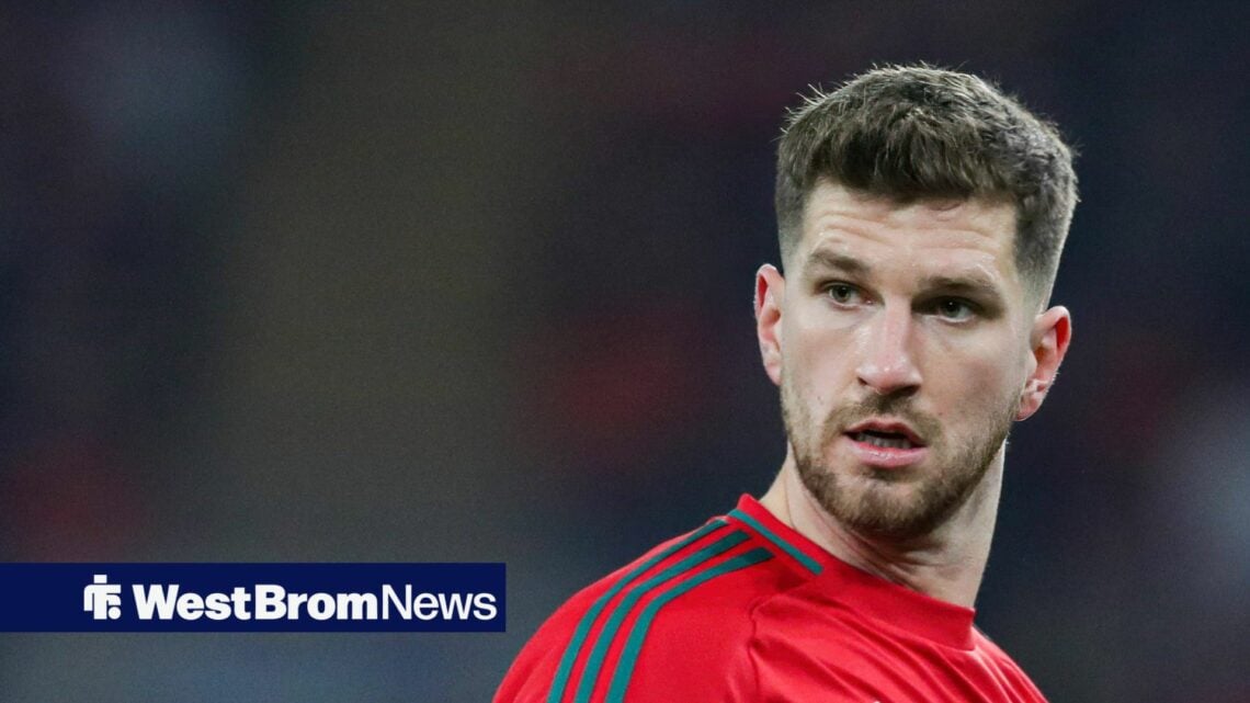 Chris Mepham in action for Wales in stand alone image