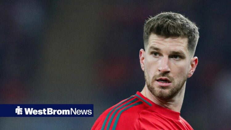 Chris Mepham in action for Wales in stand alone image