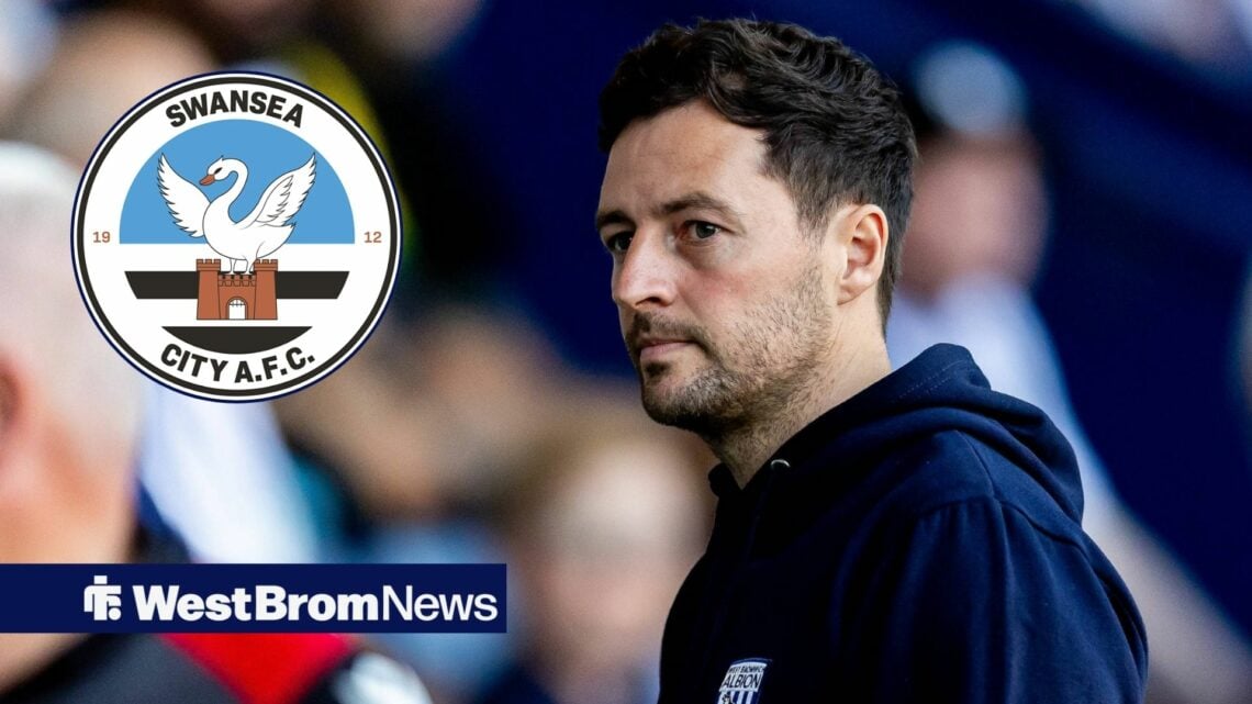 Ryan Mason looking at Swansea City badge in circle