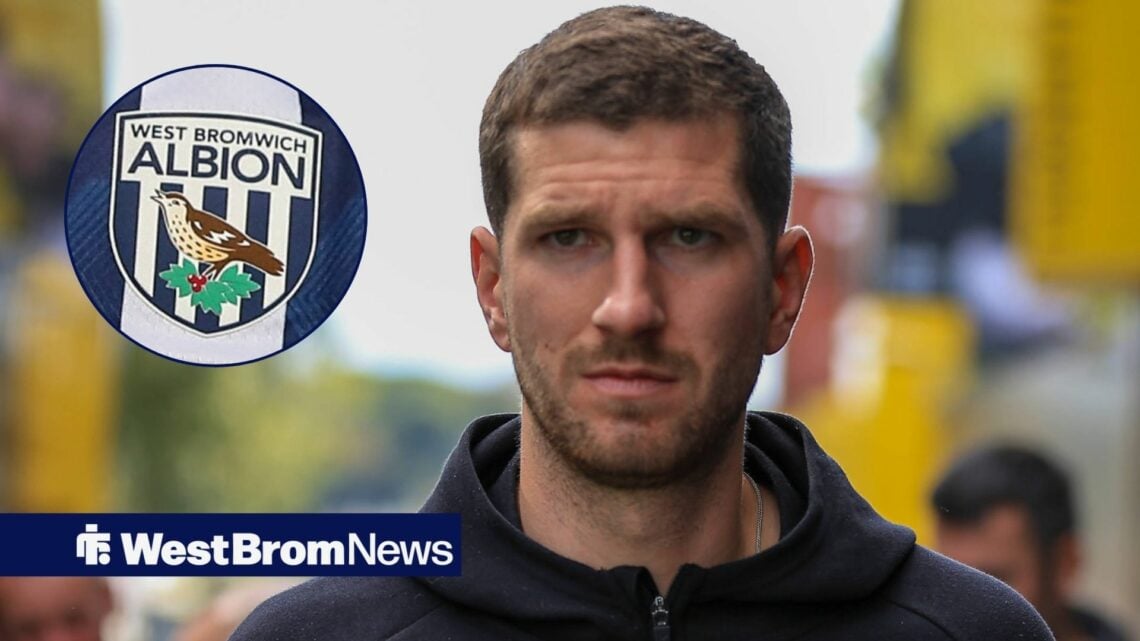 Chris Mepham looking at West Brom badge in circle