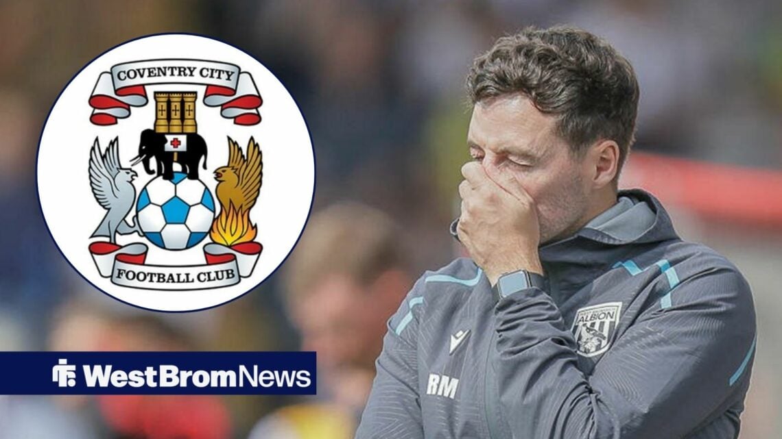 Ryan Mason in the direction of Coventry City badge in despair..