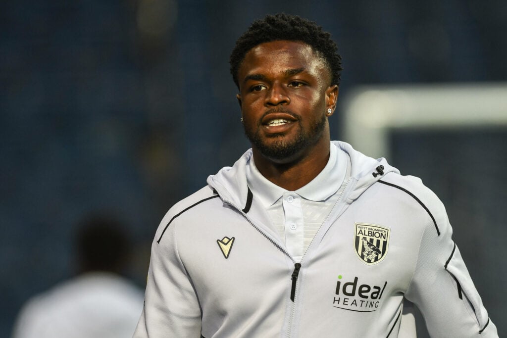 West Brom striker Josh Maja smiles as he arrives for a game.