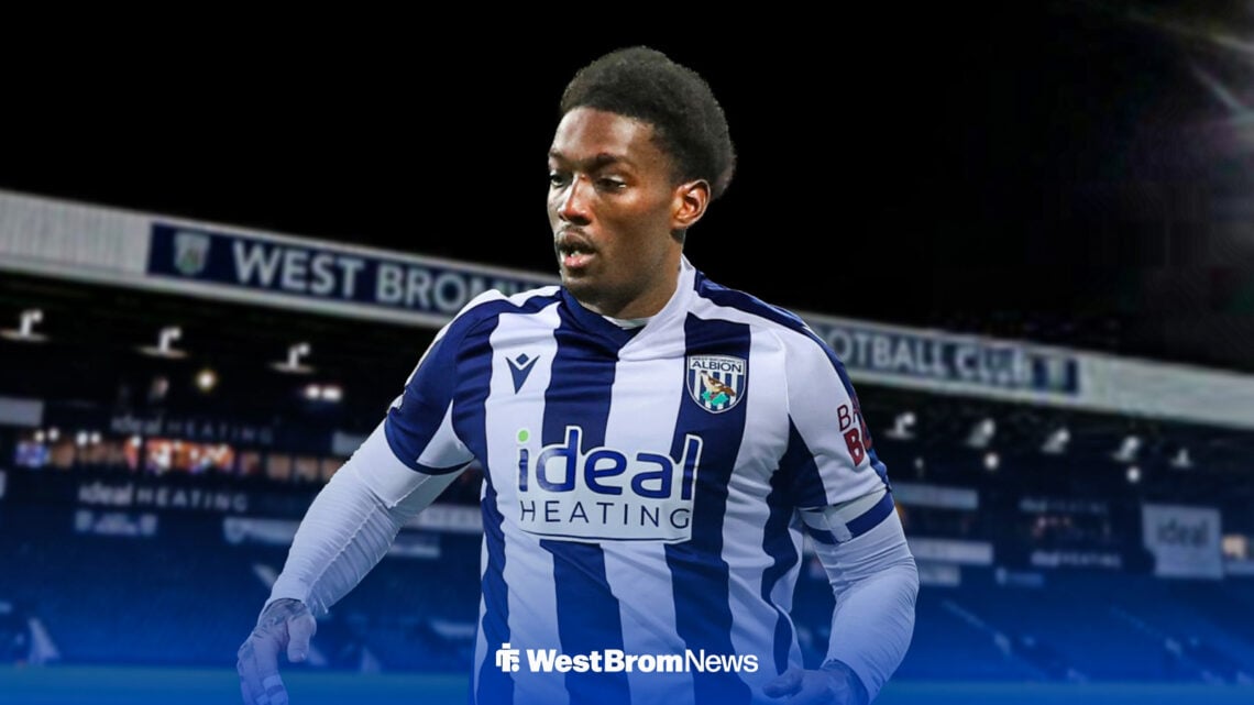 Amario Cozier-Duberry in a West Brom shirt in front of The Hawthorns.