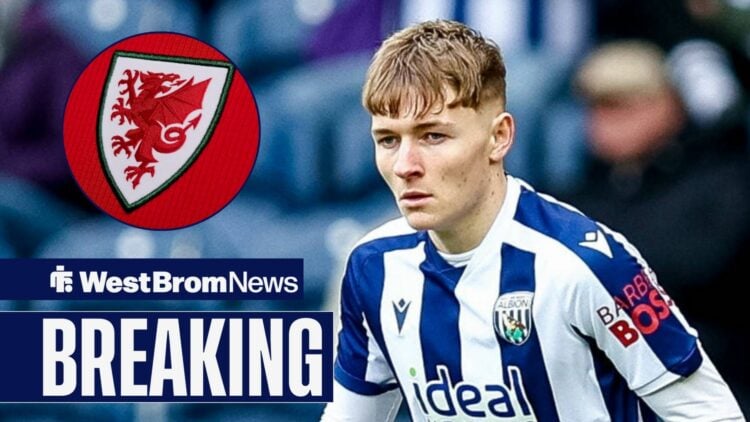 Ollie Bostock in a West Brom kit during a Championship mathc in 2026, looking at the Wales national team badge.
