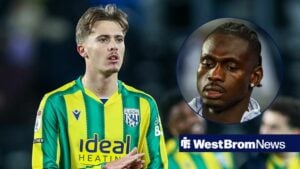 Isaac Price in the West Brom away kit looking at Ousmane Diakite.