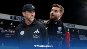 Gary Rowett looks concerned, with a smiling James Morrison behind him