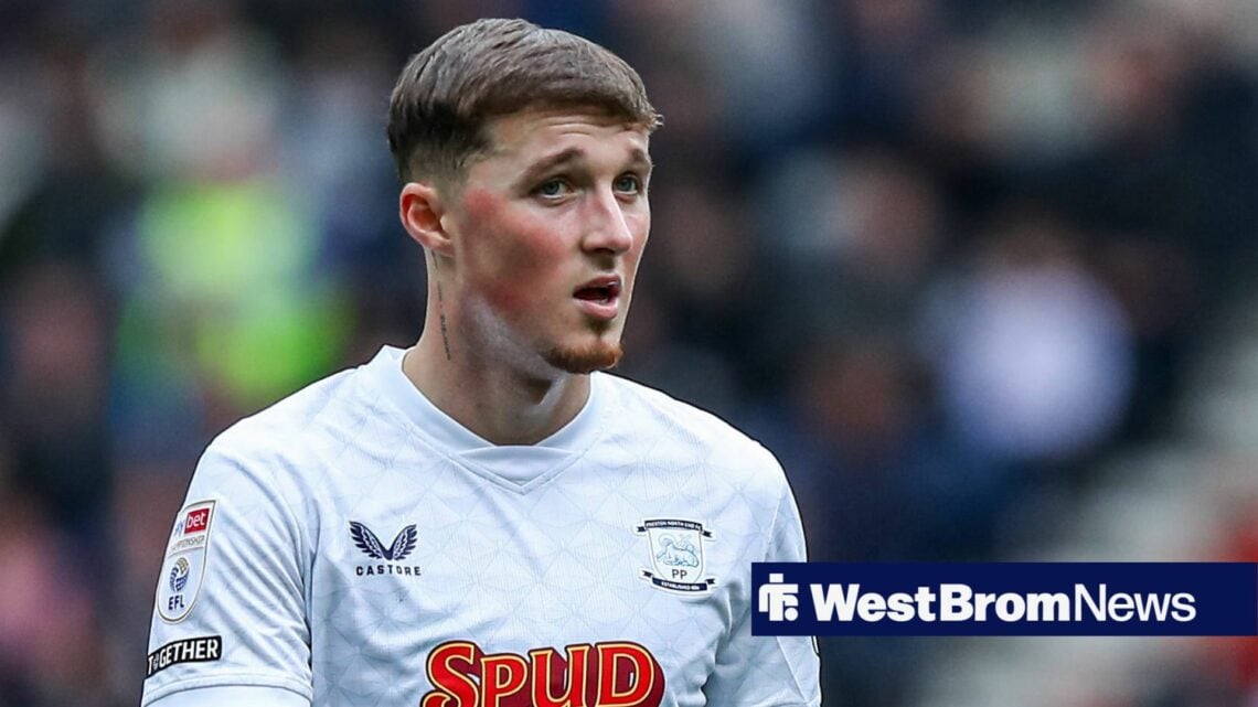 Alfie Devine looking on in a Preston North End kit while laying at Deepdale in the Championship.